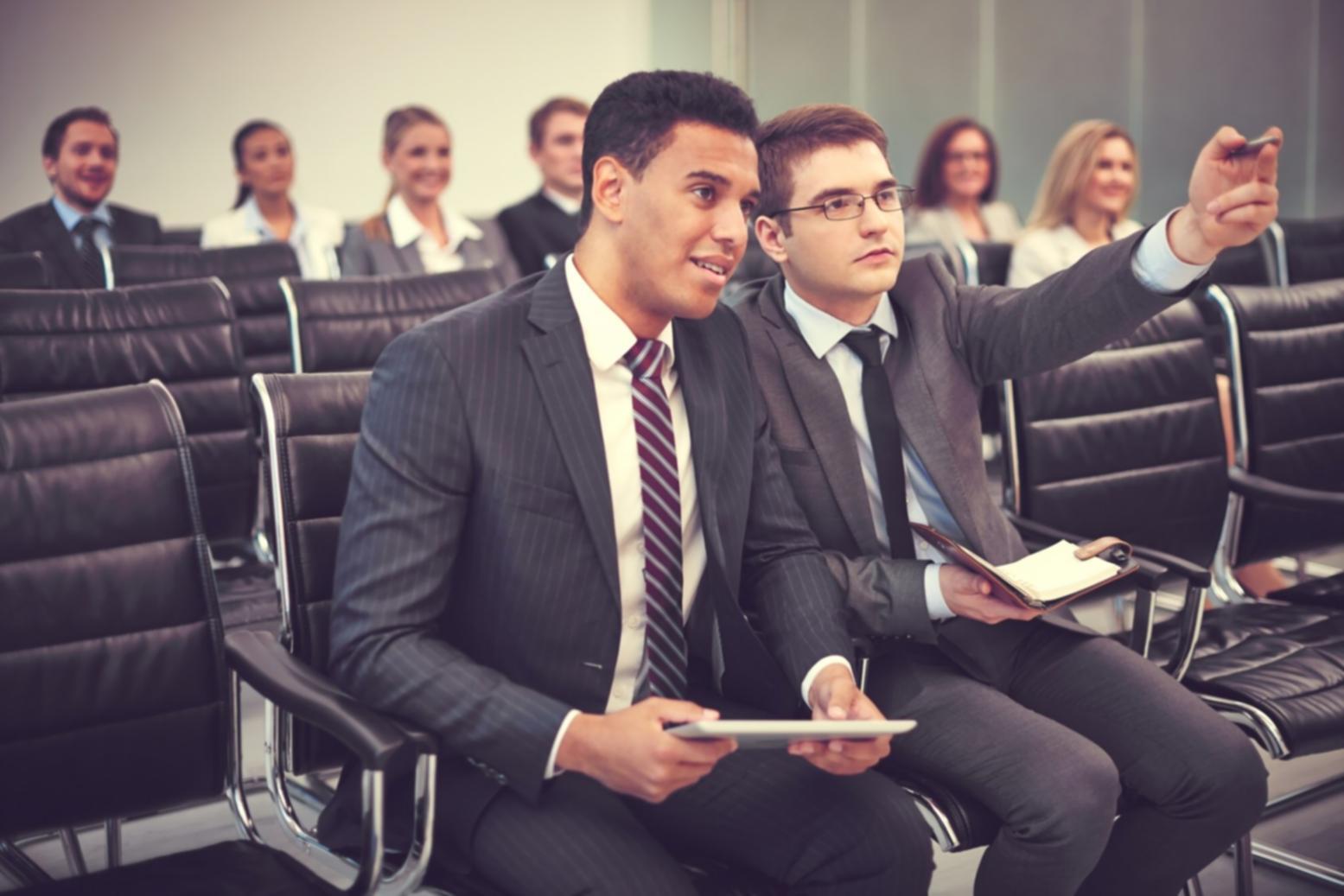 Professional financial discussion in modern office setting